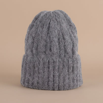 Odelisse | Wintermütze mit Zopfmuster und Umschlag